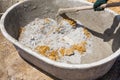 Mixing concrete in tub Royalty Free Stock Photo