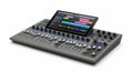 Modern audio mixing console with tablet interface for music production Royalty Free Stock Photo