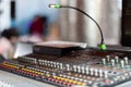 Mixing console of light equipment operator at the concert. Sound recording studio mixing desk with engineer or music Royalty Free Stock Photo