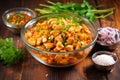 mixing diced chicken with tikka marinade Royalty Free Stock Photo