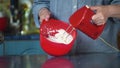 Mixing dough in bowl with motor mixer. Woman preparing a dough. Cooking cake. Close up video of a chef using an electric mixer. So