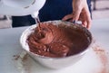 Mixing egg cream with motor mixer, baking cake Royalty Free Stock Photo