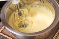Mixing eggs and sugar for cake. Royalty Free Stock Photo