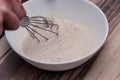 Mixing the perfect yeast dough in the white bowl Royalty Free Stock Photo