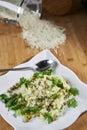 mixing rice and cheese and green peas very tasty recipe