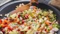 Mixing vegetables on a pan Royalty Free Stock Photo