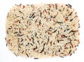 Mixing white, brown, red, wild rice on white background Royalty Free Stock Photo