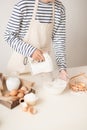 Mixing white egg cream in bowl with motor mixer, baking cake Royalty Free Stock Photo