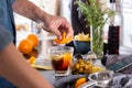 Mixologist making refreshing cocktail with vermouth at home Royalty Free Stock Photo