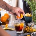 Mixologist making refreshing cocktail with vermouth at home Royalty Free Stock Photo