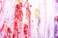 Mixture of acrylic paints. Modern artwork with spots and splashes of color paint. Liquid marble texture. Applicable for