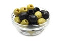 A mixture of black and green olives glass dish