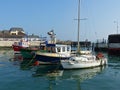 A mixture of boats on their moorings in the small harbour in the so called proud Cobh of Cork in Ireland on a beautiful day