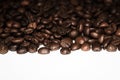A mixture of different types of roasted coffee beans in bulk. Royalty Free Stock Photo