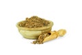 A mixture of ground peppers in a wooden cup with a spoon for spices isolated on a white background. Collection of spices