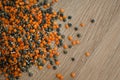 Mixture of legumes, mix of red and black lentil on wooden table. Healthy eating, vegan food Royalty Free Stock Photo