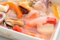 Mixture of molluscs and seafruit in oil Royalty Free Stock Photo