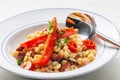 mixture of yellow peas and bacon served with red pepper and chilli