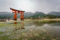 Miyajima, Floating Torii gate, low tide with reflection. Royalty Free Stock Photo