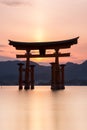 Miyajima island - Silhouette of the  Itsukushima Floating Torii Gate at sunset Royalty Free Stock Photo