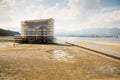 Miyajima, Japan - 11/09/2019; Miyajima island Great torii from Itsukushima shrine under restoration. Japan 2019