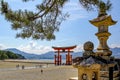 The great Torii Red at Itsukushima Shrine is a Shinto shrine on the island of Itsukushima aka Miyajima at low tide Royalty Free Stock Photo