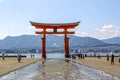 The great Torii Red at Itsukushima Shrine is a Shinto shrine on the island of Itsukushima aka Miyajima at low tide Royalty Free Stock Photo