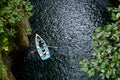 Miyazaki, Japan - November 15, 2019 : Travelers on a rowing boat at Takachiho Gorge