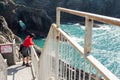 Tourist enjoy view of Mizen head in county Cork