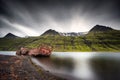 Mjoifjordur, Iceland - Abandoned fishing boat rusts in fjord Royalty Free Stock Photo