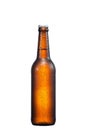 500ml brown beer beer bottle with drops isolated without shadow on a white background
