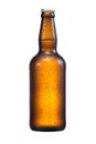 500ml brown beer beer bottle with drops isolated without shadow on a white background