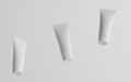 100ml Cosmetic Cream Tube Packaging Mockup - Three Floating Tubes. 3D Illustration