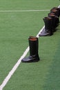 Mlitary boots and White line on green lawn Royalty Free Stock Photo