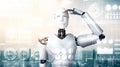 MLP Humanoid AI robot looking at hologram screen showing concept of big data Royalty Free Stock Photo