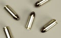 9mm bullets isolated on beige background.