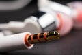 3.5 mm, mini jack, headphones cable on a white background closeup, macro Royalty Free Stock Photo