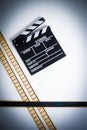 35mm movie filmstrip with clapper board, vintage color, vertical