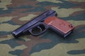 9mm russian handgun on russian camouflage uniform Royalty Free Stock Photo