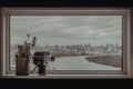 8mm vintage movie camera and Dried flowers in Mini brown leather bag by the glass wall with city and river view