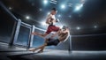 MMA cage. Knee kick to the head. Two fighters are fighting in the octagon. Jump kick. Sport action concept. 3D