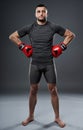 MMA fighter posing on gray Royalty Free Stock Photo