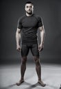 MMA fighter posing on gray Royalty Free Stock Photo