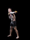 MMA fighter practising punching on black background Royalty Free Stock Photo