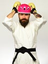 MMA sports concept. Man with beard in white kimono Royalty Free Stock Photo