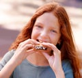 Mmm, its my favorite. Cute little girl eating a delicious smore.