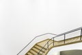 MNBA interior staircase, architectural detail, white wall and light wood steps