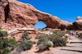 Visitors on a trail to the North Window Arch in the Windows section of Arches National Park