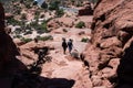 Visitors walking on a trail at Garden of Eden viewpoint in Arches National Park Royalty Free Stock Photo