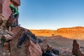 3/21/19 Moab, Utah. Woman packing up her gear after a long day of rock climbing.